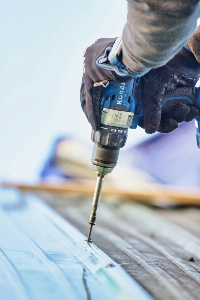 Power drill in action on a job site